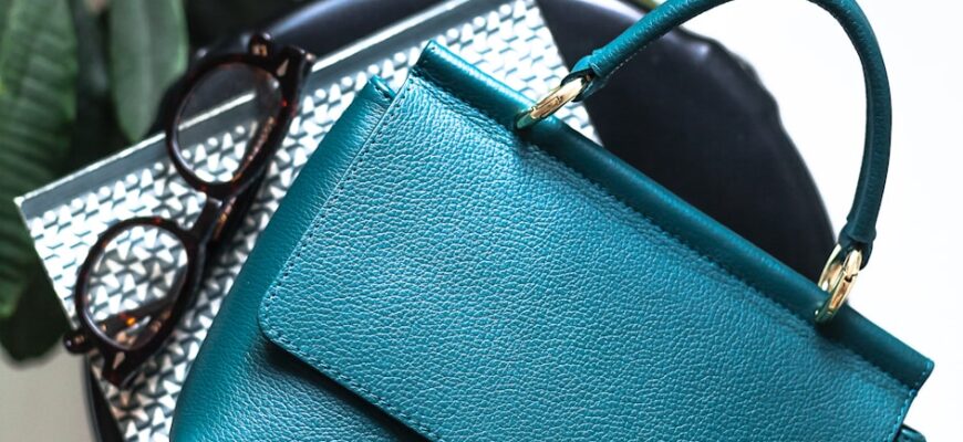 blue leather handbag on black leather bag