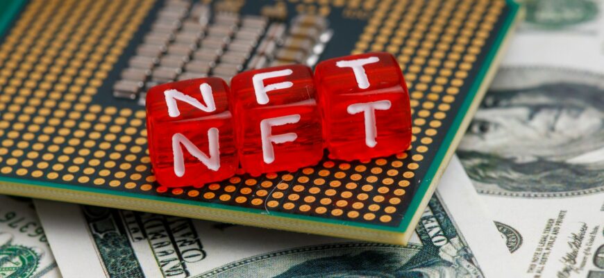 a close up of a small red block on top of a pile of money